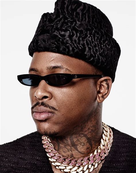 rapper wearing glasses|rapper with diamond glasses.